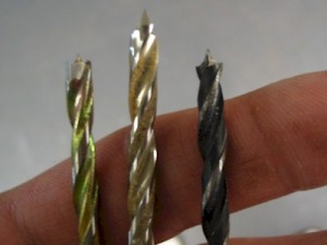 3/16" brad point bits, from left to right: carbide tipped, high speed steel, and "junk"