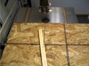 A special jig is used to cut a 10 miter on the side pieces