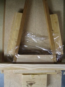 A simple jig is used to ensure that the pinblock stays put during glue-up